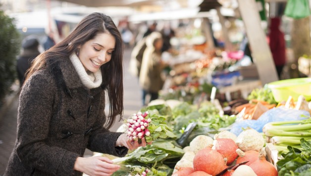 Woman Picking Fresh Vegetables